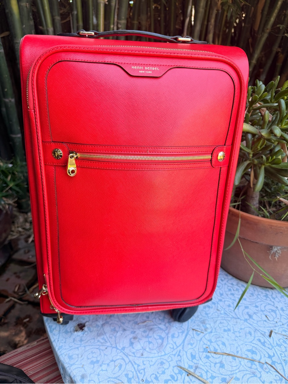 henri bendel Red Upright Carry-On with Gold Hardware